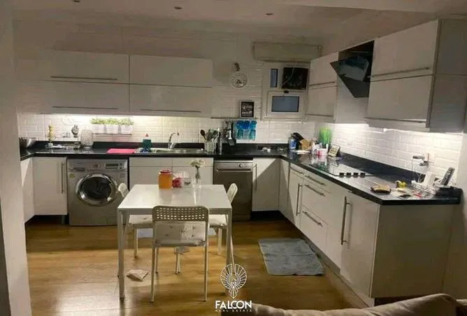 شقة 65 م² للبيع في American University Housing District