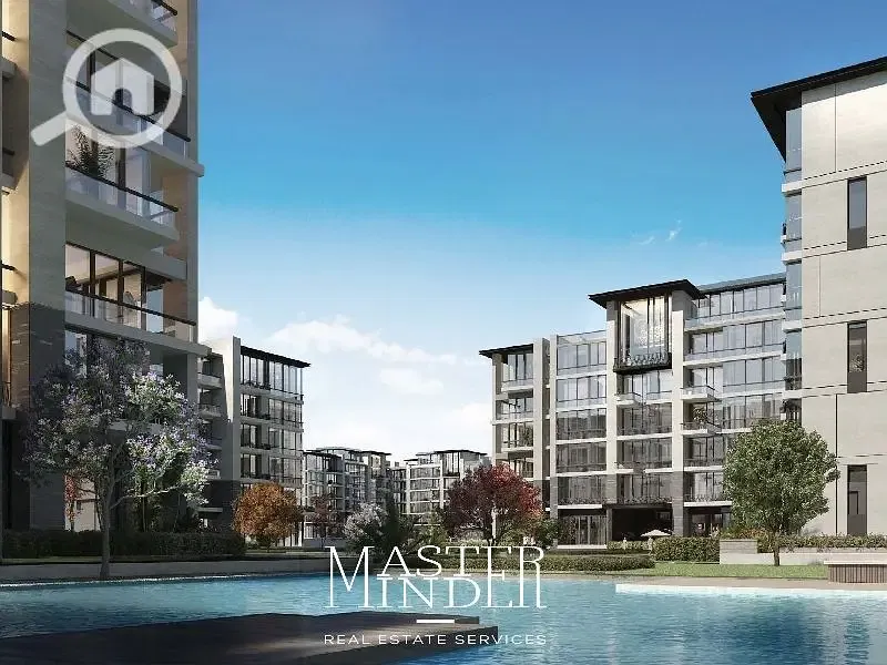 Fully finished Apartment with private garden for sale with installments overlooking the lake in The View by Waterway