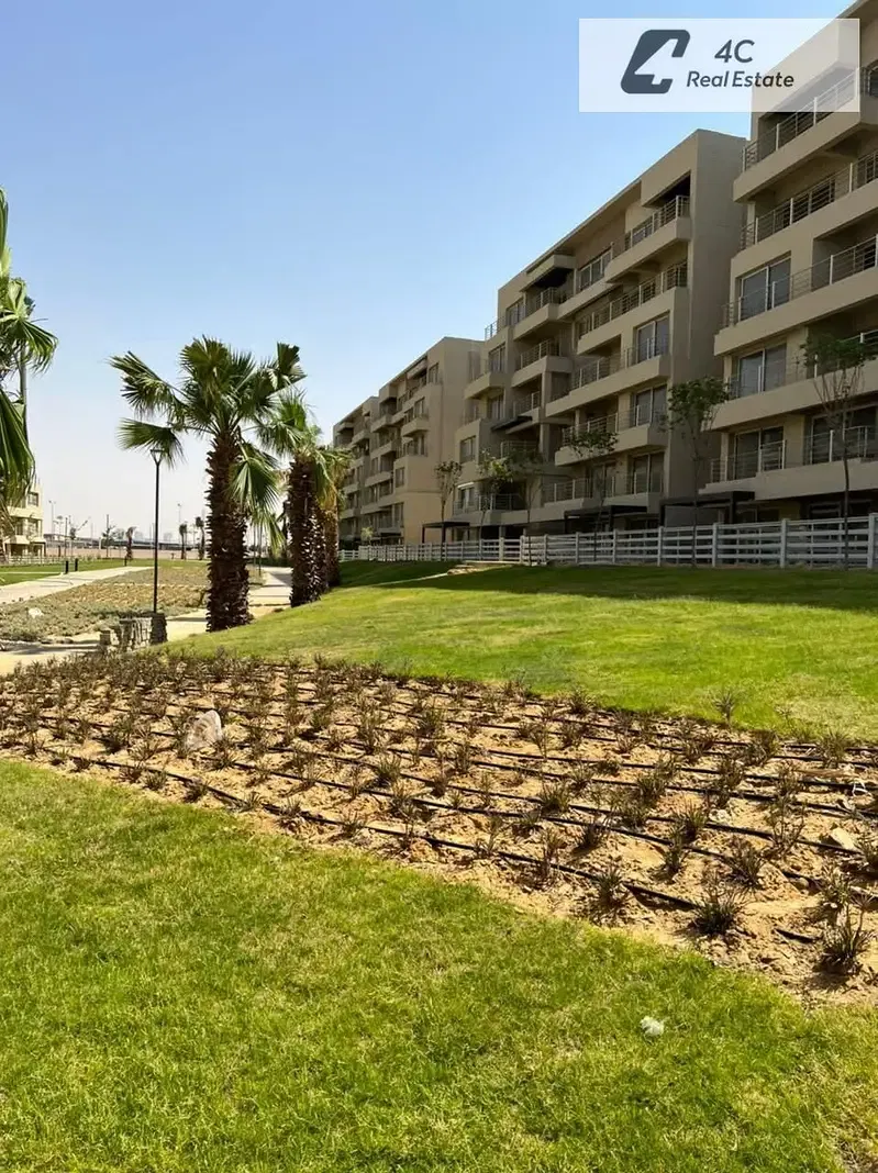 Lowest price for a 2-bedroom apartment with down payment and installments, overlooking the commercial area of Sarai in Palm Hills Capital Gardens