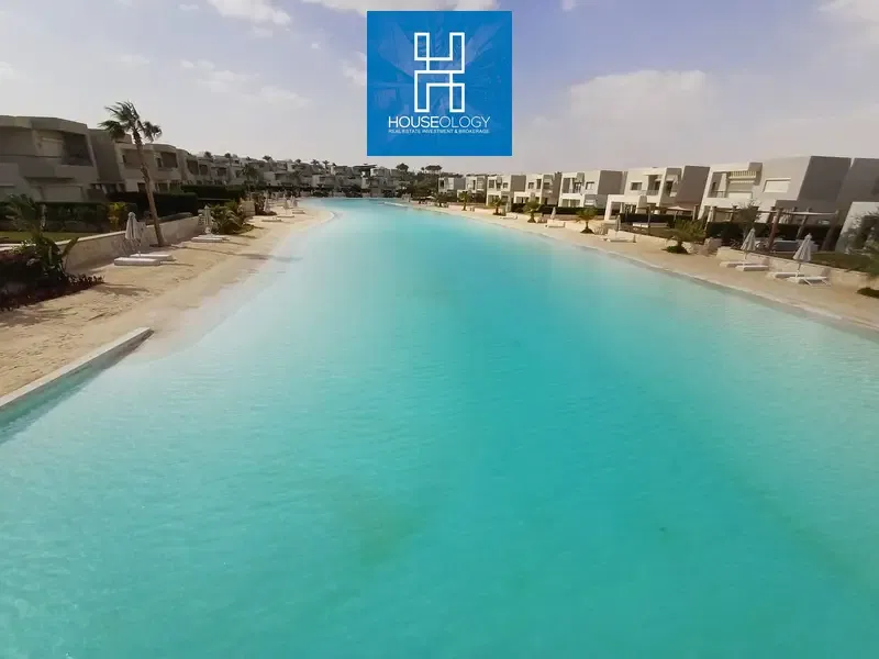 Corner townhouse resale, first row, lagoon, for sale in Azha North Coast, at a price lower than the company price.