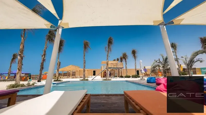 Lowest price for a chalet for sale in a prime location with a direct lagoon view at Cali Coast – North Coast.