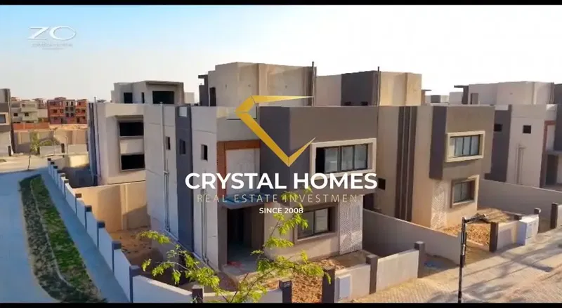 Villa for sale in a compound on the Dahshur Link in front of Beverly Hills Zayed, installment directly from the owner in a high-end compound.