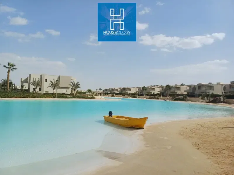 Twin house with a unique view of the lagoon for sale in Azha North, finished with air conditioning and the kitchen.