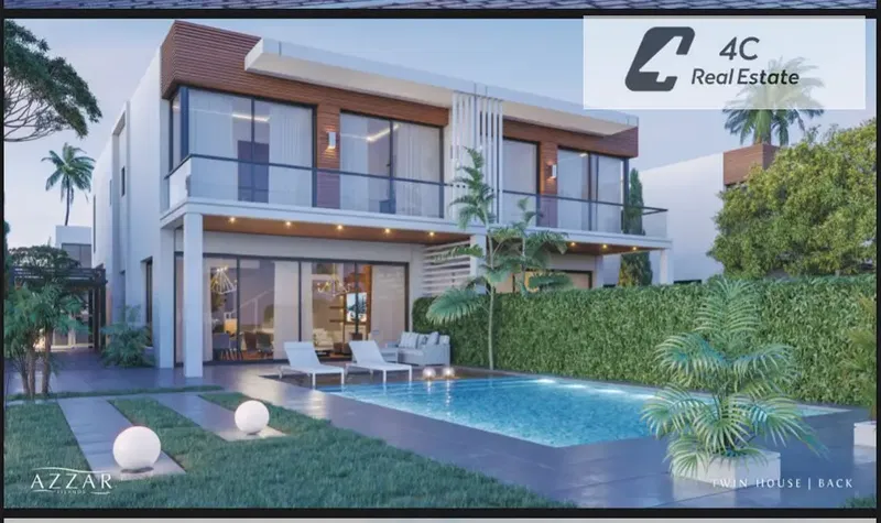 Townhouse Middle with down payment and installments direct lagoon view resale below developer price in Azzar Island New Cairo for sale