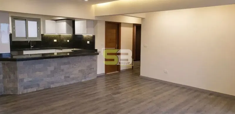 Ground floor apartment with a garden, finished with facilities over a year in Al-Khamail compound.