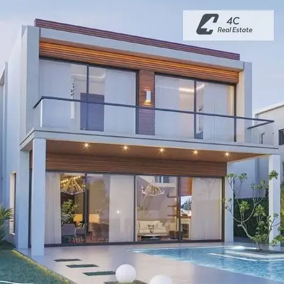 Townhouse Middle with down payment and installments direct lagoon view resale below developer price in Azzar Island New Cairo for sale