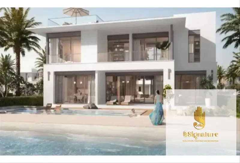 For sale: Chalet with a roof terrace, 3 bedrooms, directly on the lagoon, at a special price for a quick sale in Cali Coast, Ras El Hekma, North Coast