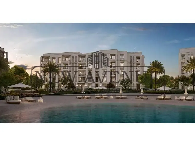 Fully finished corner ground apartment direct on lake with installments in Mivida Gardens
