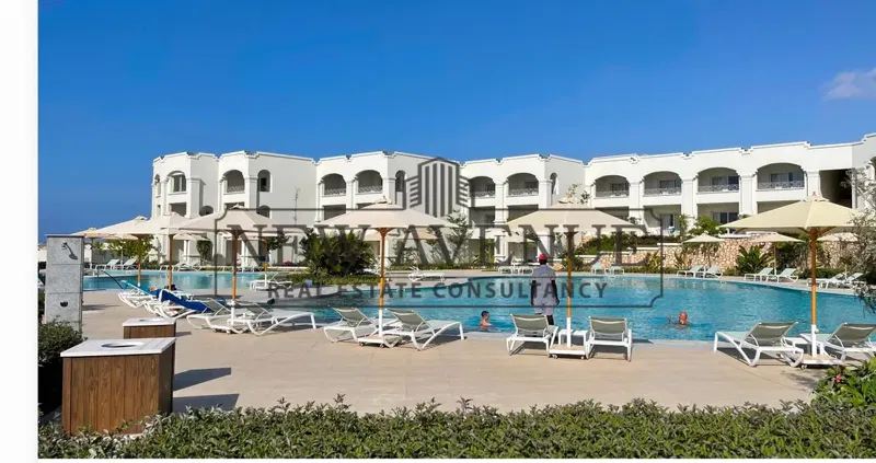 Resale first-row chalet on the lagoon Fully finished in Hacienda Heneish by Palm Hills, with down payment and installments, delivery 2027.
