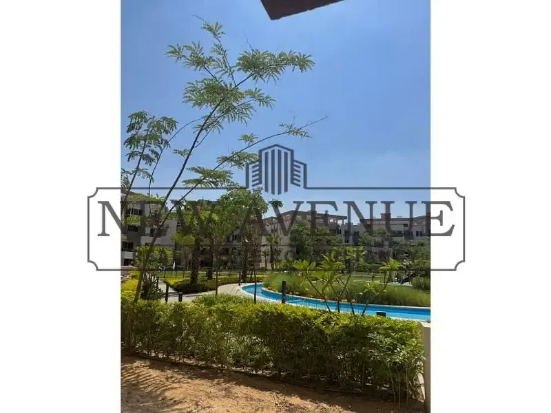Lowest price for 4 bedrooms apartment for sale in Granda Life direct on water features and landscape ready to move with installments
