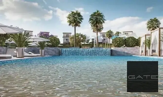 Resale townhouse for sale at the lowest down payment in Azzar Island, North Coast; directly overlooking the lagoon.
