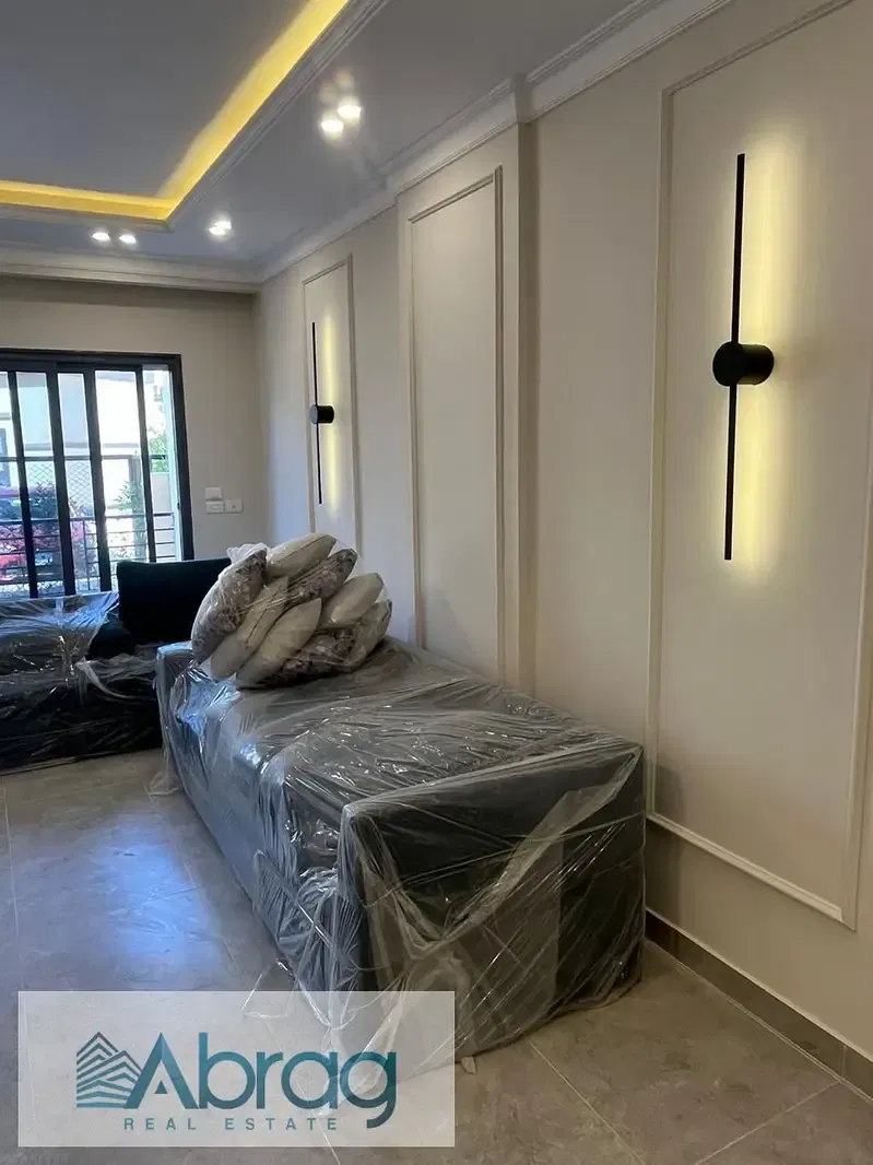 For sale: First occupancy apartment, 177 square meters, hotel-style finishing, installments remaining, in Tala Compound, 6th of October City.