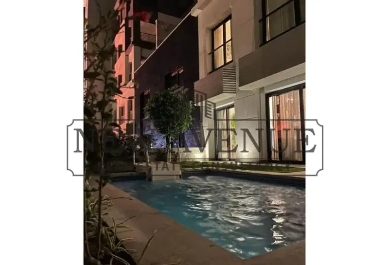 Townhouse for sale with Down Payment 5 % - installments over 9 years Trio Gardens Compound - 5th Settlement