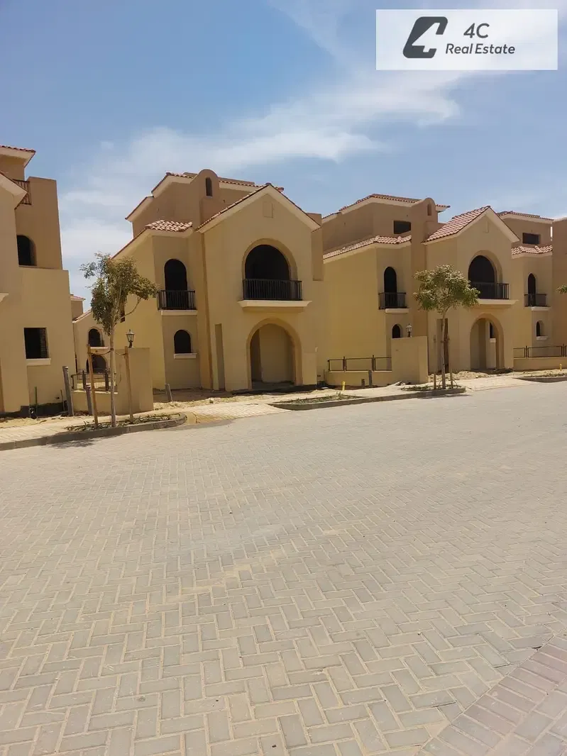 villa with down payment and installments lagoon and landscape view resale below market price in Sarai New Cairo near Madinaty for sale