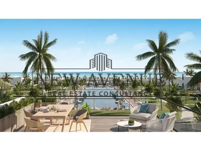 Lowest ground duplex in Telal East overlooking directlly the lake with a private garden
