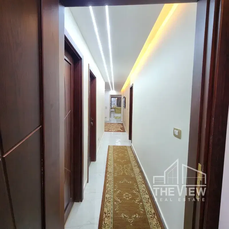 Penthouse with a share of the land for sale in Al Khamael Compound, Sheikh Zayed - Super Lux finishing, first occupancy, sold furnished or unfurnished