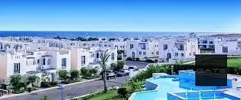 **Resale | For Sale – Lowest Price** Twin house, first row on the lagoon, immediate delivery in Mountain View Ras El Hekma (North Coast).