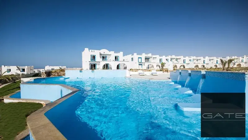 Resale – For sale: lowest price middle townhouse with immediate delivery and a swimming pool view in Mountain View Ras El Hekma.