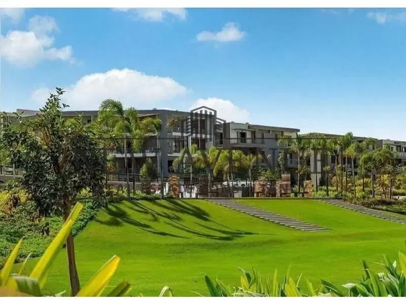 Q villa ground overlooking lake delivered with installments prime location in Taj city shalya compound