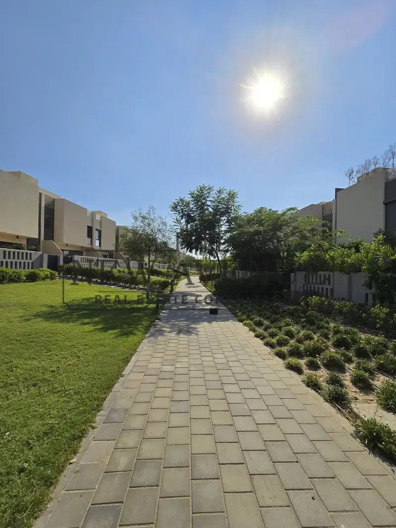 Lowest down payment for a townhouse in Al Burouj featuring a large area with installments delivery in 2027