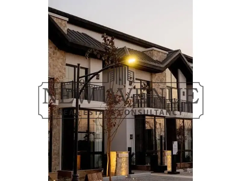 Townhouse overlooking green spaces, European design with front and back gardens