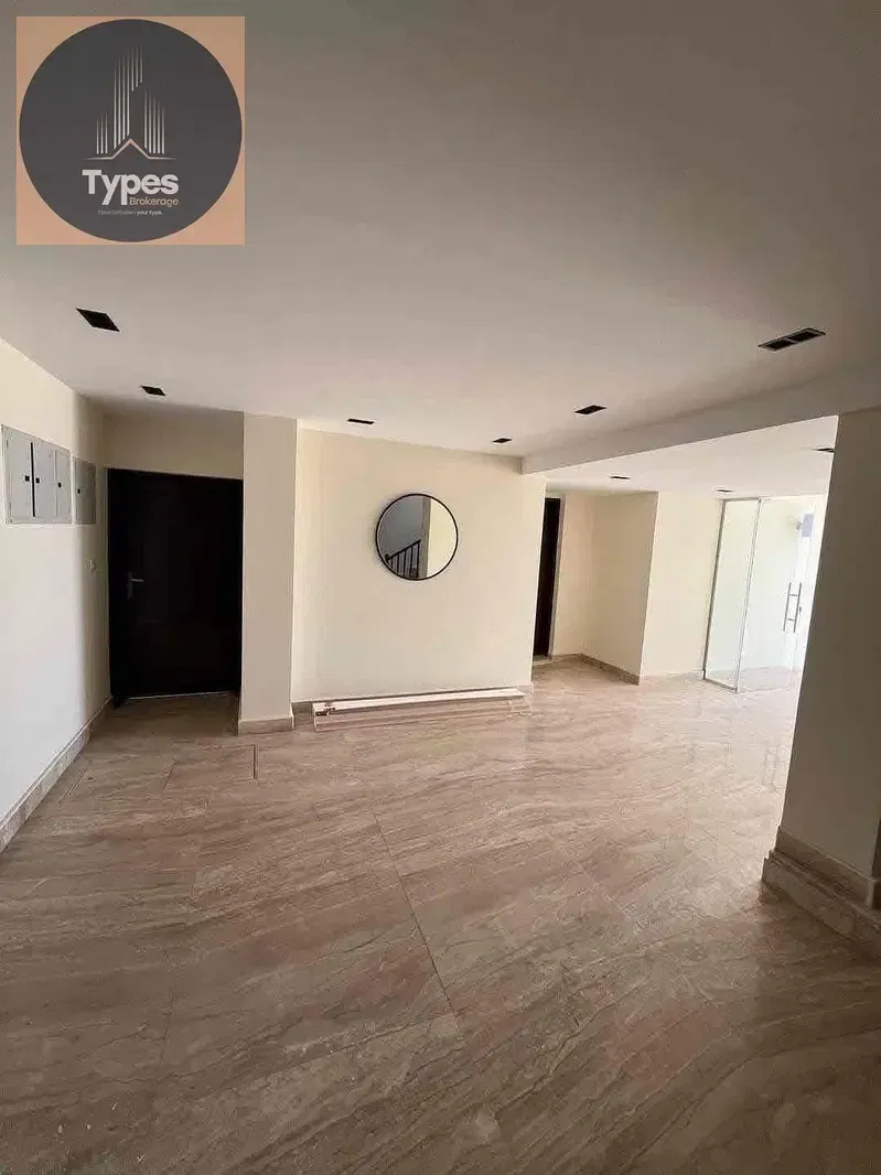 For sale at the lowest price: a finished second-floor apartment, ready for immediate occupancy, in Place Gate Compound, next to Cairo Gate, Emaar, and