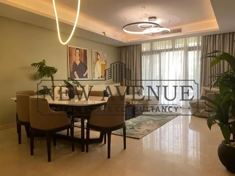 Ready to move Ultra super lux Finishing Ground Apartment with garden and Landscape view in Aura Cairo Festival City New Cairo developed by Al Futtaim