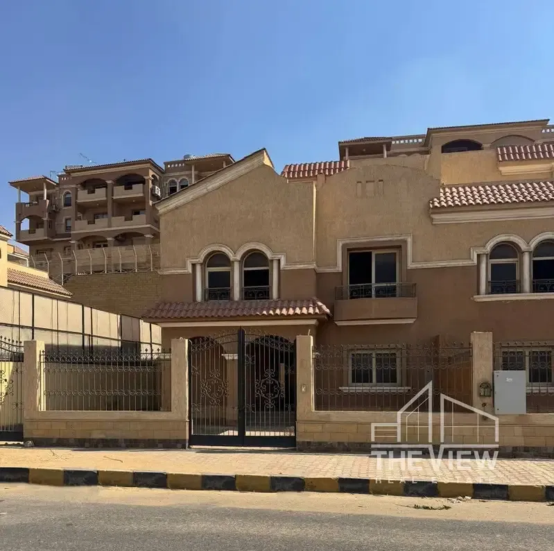 Twin house with a share of the land, with a stunning view, in Al Khamael Compound, Sheikh Zayed, opposite Hyper One View Zayed. Semi-finished,
