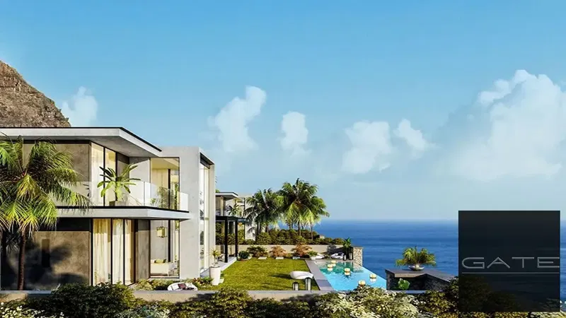 Townhouse for sale, corner unit in Cali Coast, North Coast, great location and direct view of the lagoon, fully finished, delivery in 2027.